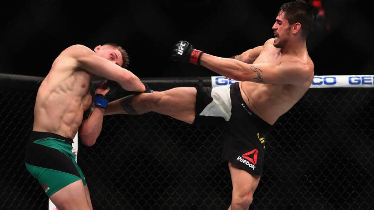 Antonio Carlos Junior kicks Marvin Vettori during their middleweight bout at UFC 207.