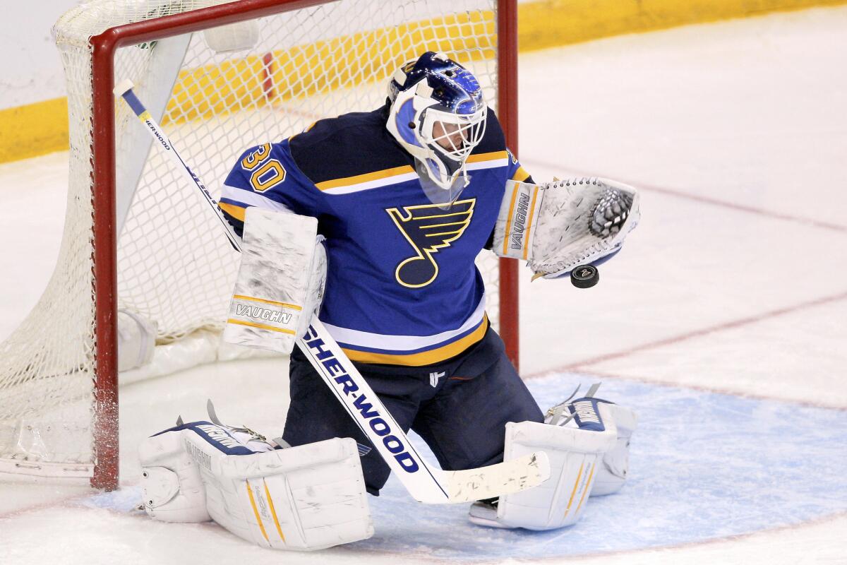 St. Louis goalie Martin Brodeur stops a shot during the third period of a game against Colorado on Dec. 29. The Blues beat the Avalanche, 3-0, and play the Ducks on Friday night in Anaheim.