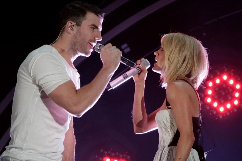 Sam Hunt and Carrie Underwood perform at the Grammy Awards at Staples Center in Los Angeles in 2016. Both are among the performers for the 2017 Academy of Country Music Awards.