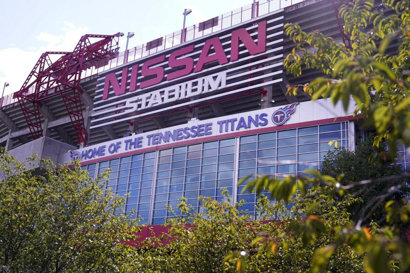 Nissan Stadium, home of the Tennessee Titans, is shown Tuesday, Sept. 29, 2020, in Nashville, Tenn. The Titans suspended in-person activities through Friday after the NFL says three Titans players and five personnel tested positive for the coronavirus, becoming the first COVID-19 outbreak of the NFL season in Week 4. (AP Photo/Mark Humphrey)