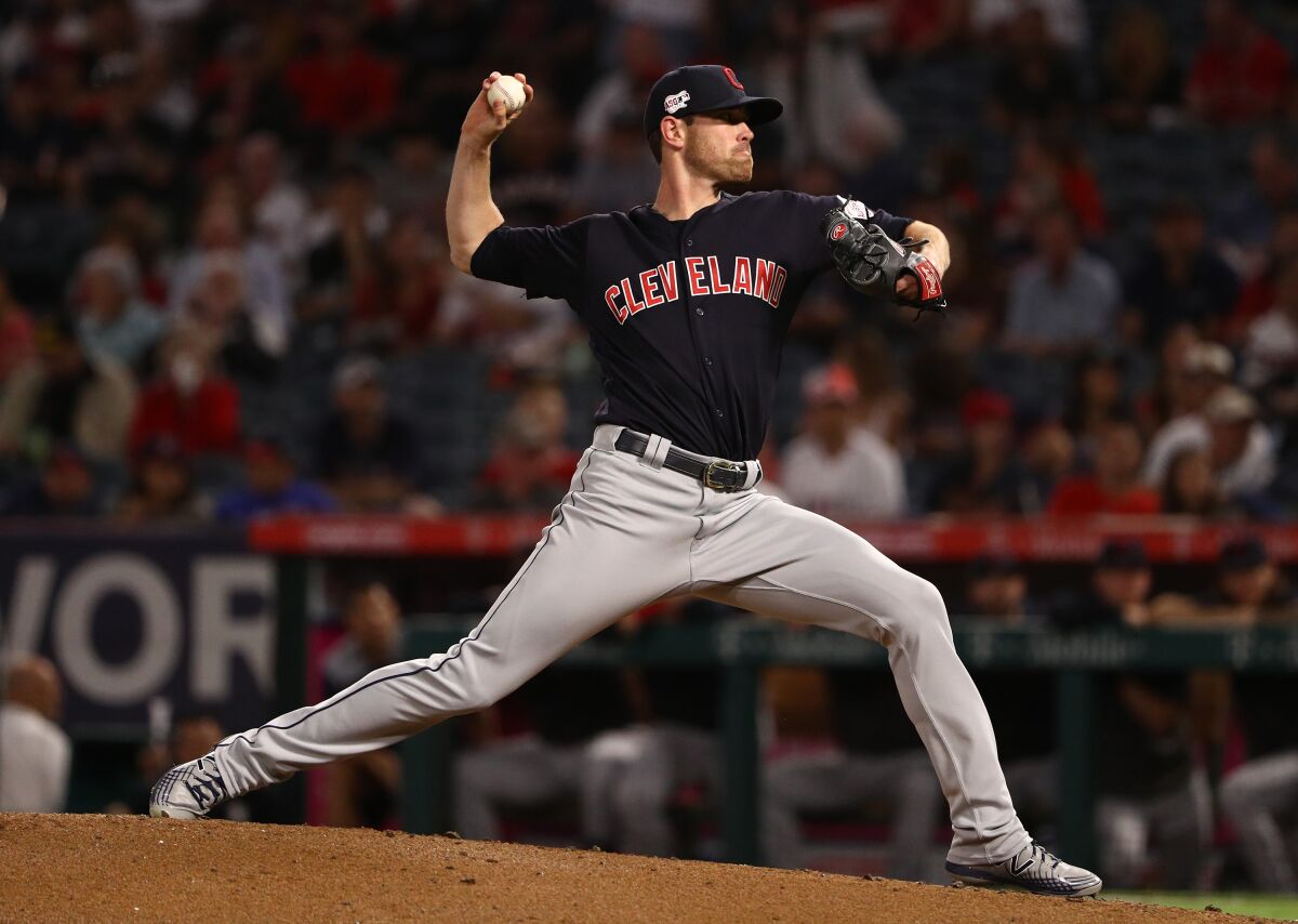 Cleveland Indians pitcher Shane Bieber pitches during the first inning against the Angels at Angel Stadium on Monday.