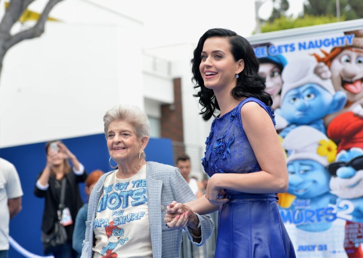 Katy Perry, right, arrives at "The Smurfs 2" premiere with her grandmother, Ann Hudson.