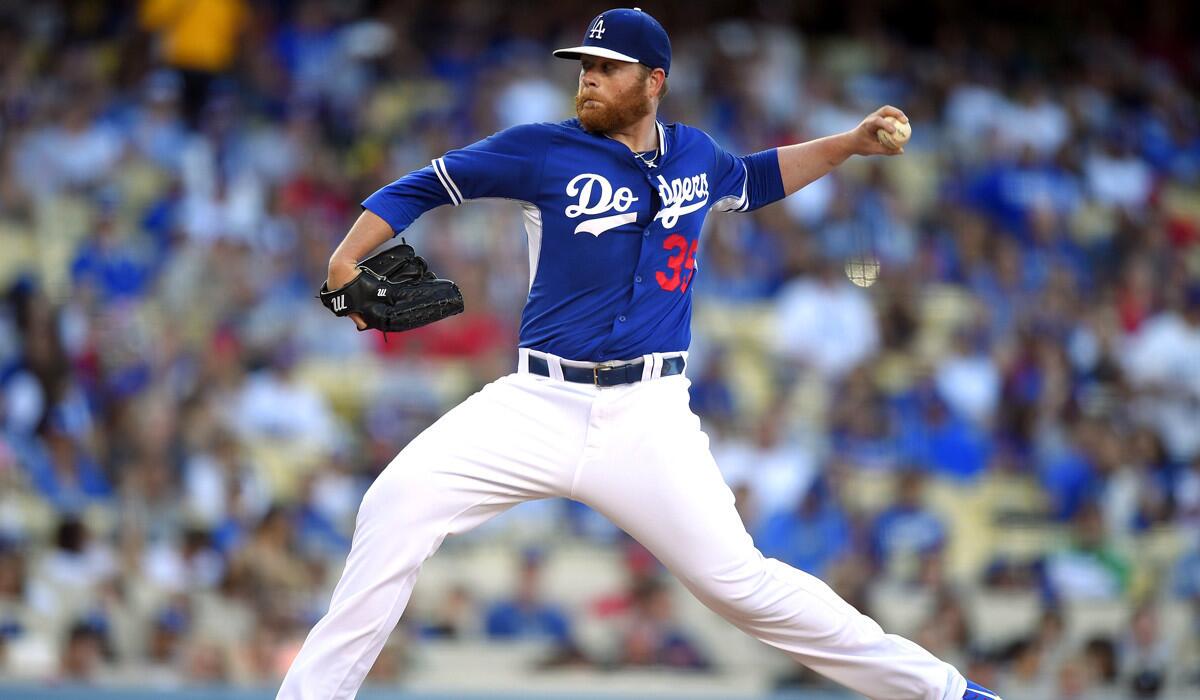 Dodgers starting pitcher Brett Anderson pitches during a 6-6 tie to the Angels Saturday night at Dodger Stadium.