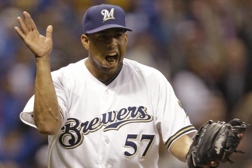 Milwaukee Brewers reliever Francisco Rodriguez celebrates after the final out of an April 2014 game against the Chicago Cubs.