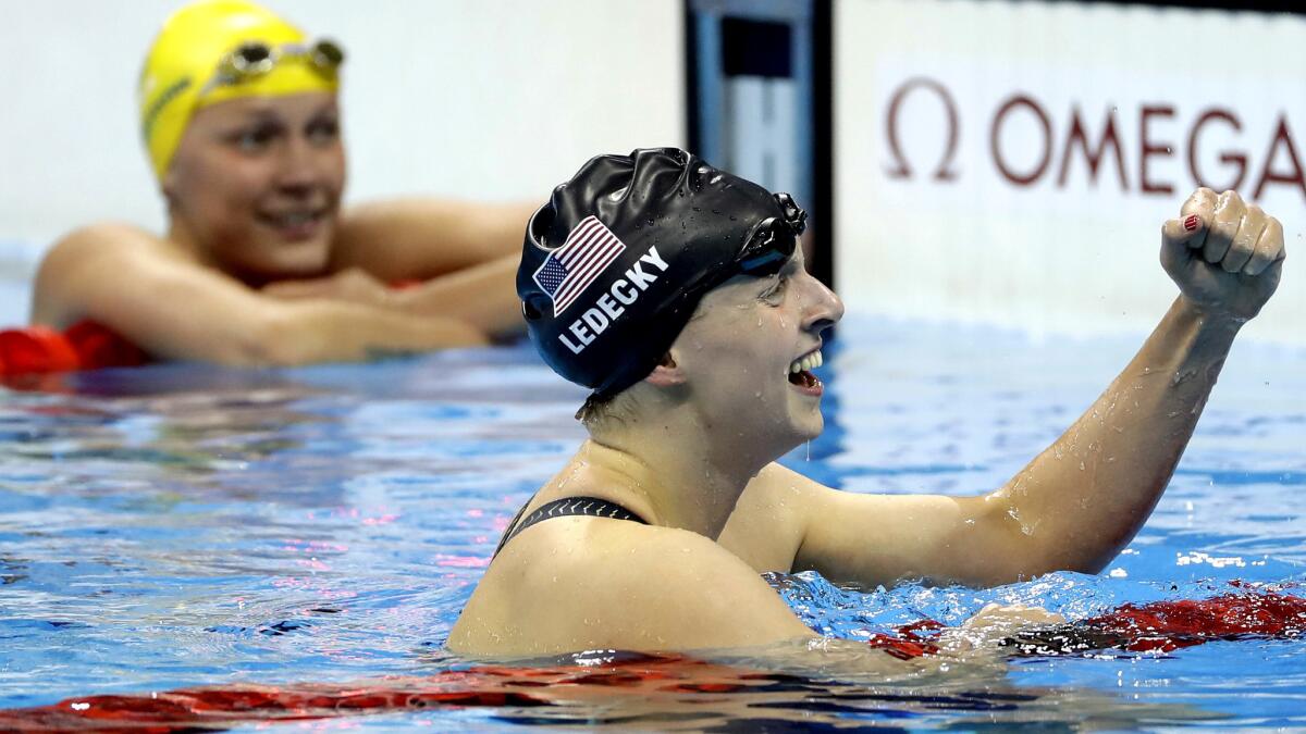 American swimmer Katie Ledecky celebrates after winning the gold medal in the women's 200-meter freestyle on Tuesday.