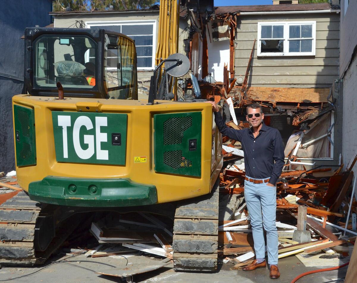 Garrett Calacci supervises the demolition of 224 Marine Ave. on Balboa Island.