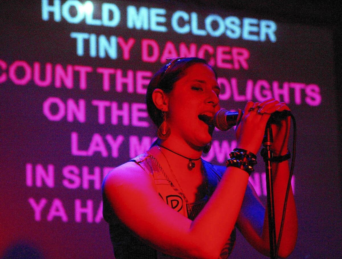Deb Kavis, of San Fernando, performs karaoke 'Tiny Dancer' at Complex L.A. in Glendale, hosted by Ground Control Karaoke on Monday, March 3, 2014.