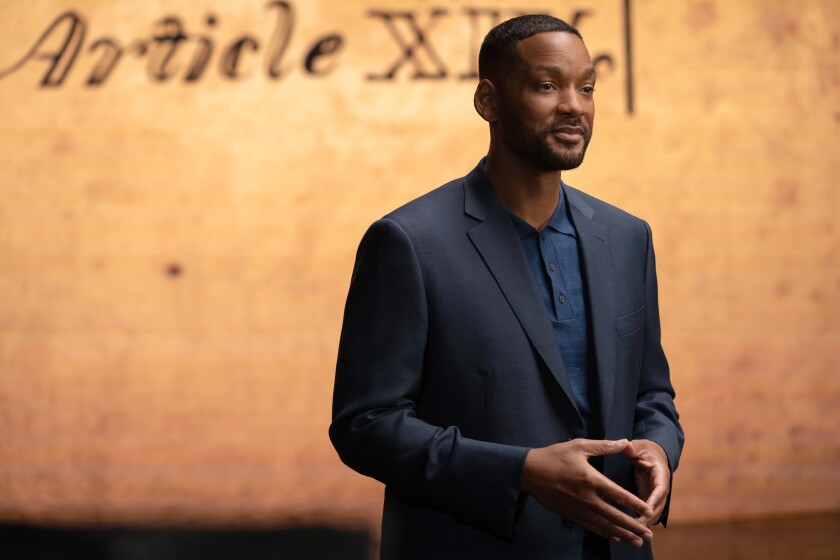 Fotograma cedido por Netflix donde aparece Will Smith presentando "Amend: The Fight For America".