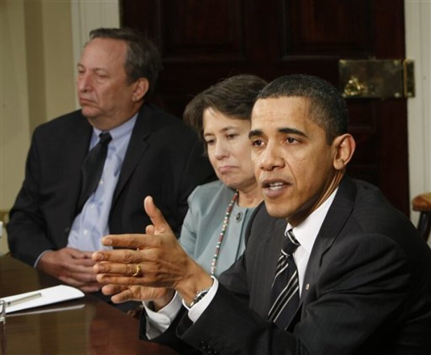 President Barack Obama, accompanied by his economic advisers, make remarks in the Roosevelt Room of the White House in Washington, Friday, April 10, 2009. From left are, National Economic Council Director Lawrence Summers, FDIC Chairman Sheila Bair and the president. (AP Photo/Gerald Herbert)
