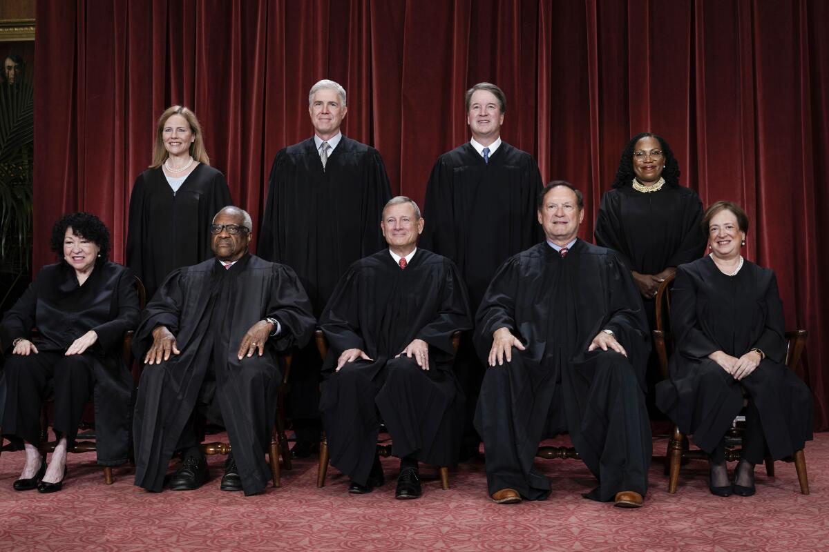 Members of the Supreme Court sit for a group portrait.