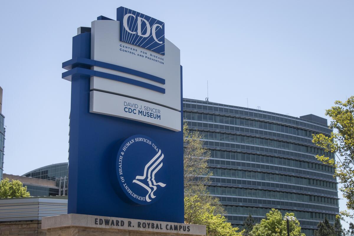 The exterior of a large building with a CDC sign