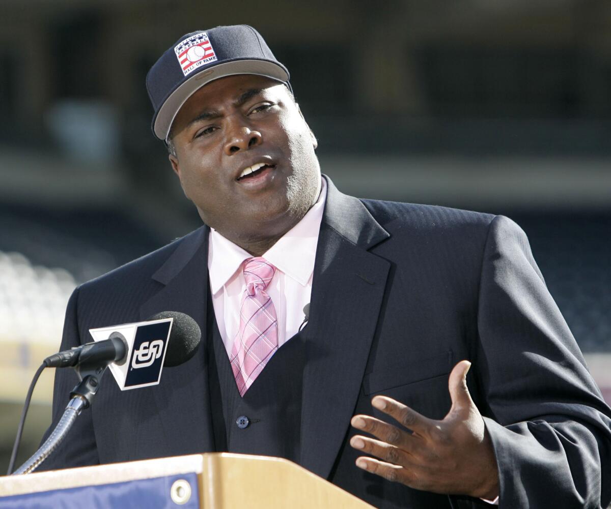 Tony Gwynn of the San Diego Padres tips his hat to the crowd at