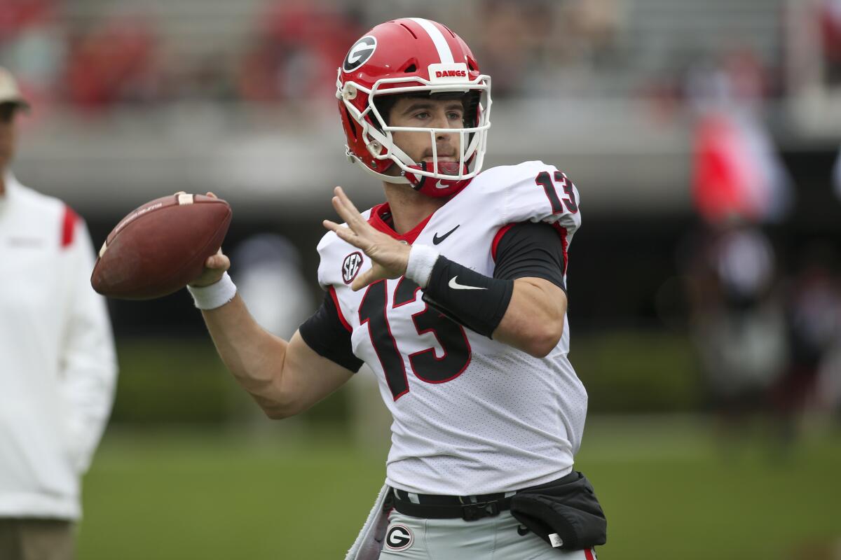 Georgia quarterback Stetson Bennett warms up before the Bulldogs' spring game in April.