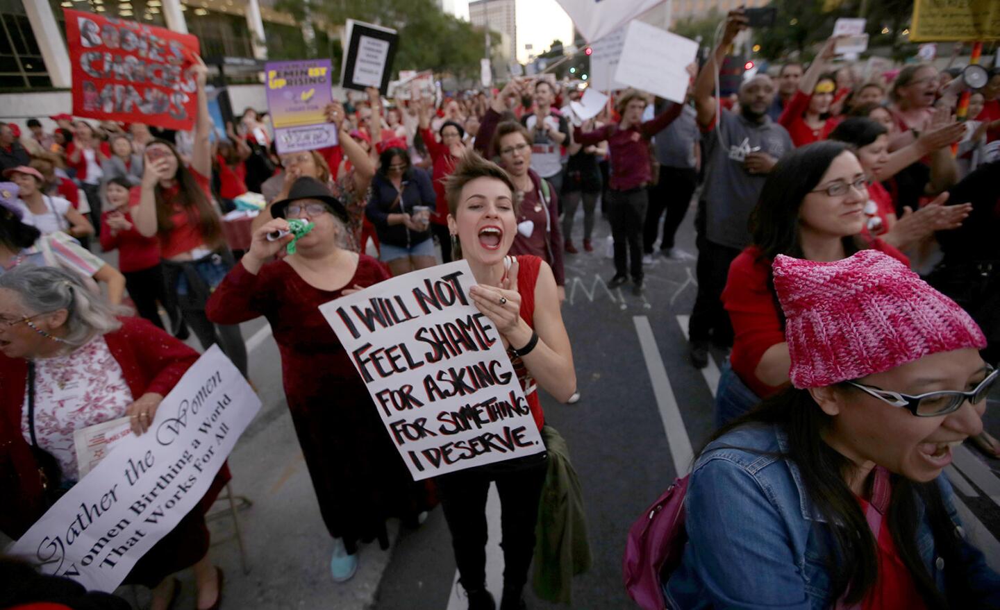 Jaki Capozzoli participates in a rally for "A Day Without a Woman" in front of the Federal Building in downtown Los Angeles.