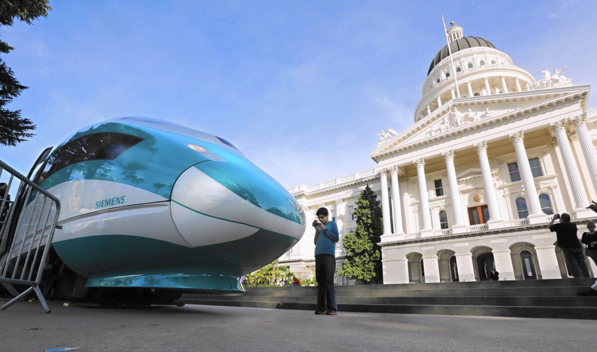 A 2015 photo shows a full-scale mock-up of a high-speed train displayed at the Capitol in Sacramento.