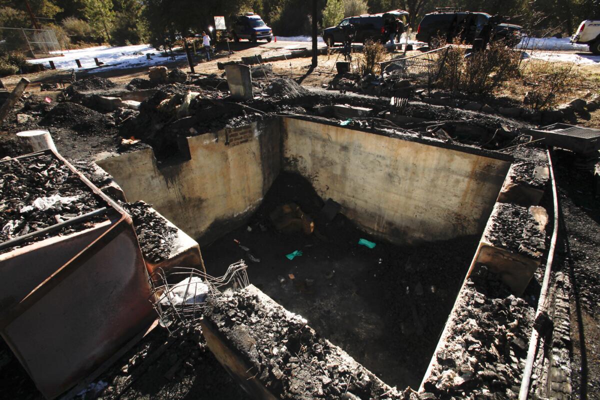 The rear area of the cabin on Seven Oaks Road in Angelus Oaks where Christopher Dorner died in a shootout with law enforcement.