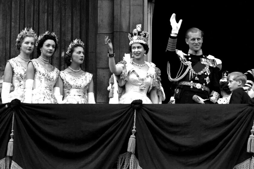 Britain's Queen Elizabeth II and Prince Philip, Duke of Edinburgh, gather with other members of the British royal family 