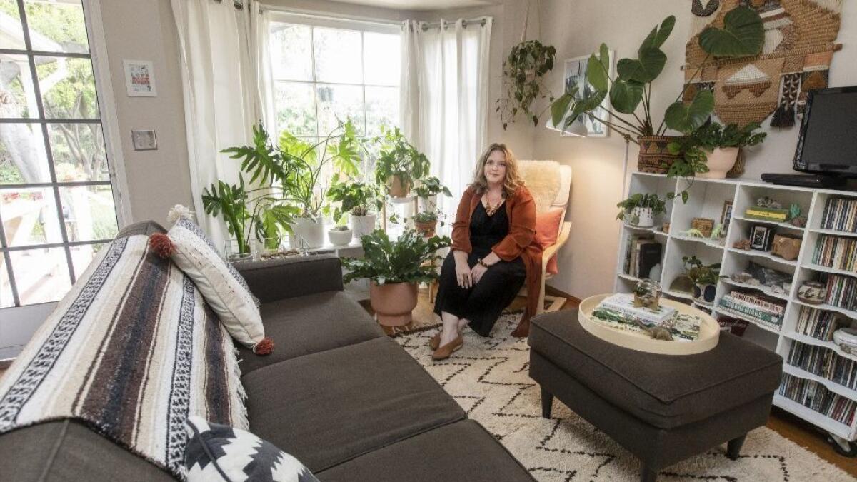Danae Horst, at home with her plants in Pasadena.