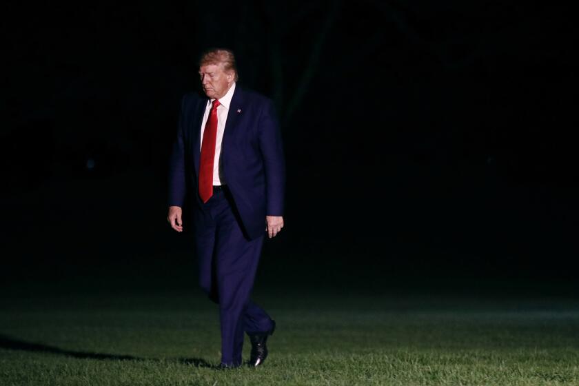 President Donald Trump walks on the South Lawn of the White House in Washington, Friday, Oct. 11, 2019, as he returns from a campaign rally in Minneapolis. (AP Photo/Patrick Semansky)