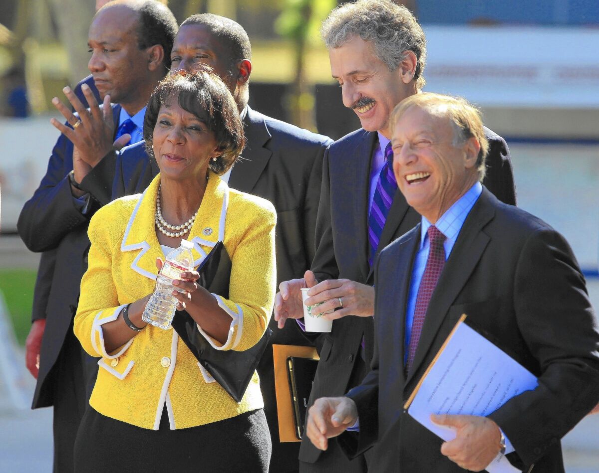 Dist. Atty. Jackie Lacey, City Atty. Mike Feuer and L.A. County Superior Court Presiding Judge David Wesley, right, at a news conference on the pilot mental health diversion program, which they support.