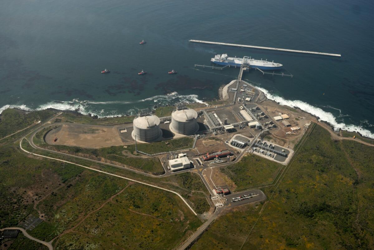 Aerial view of a gas storage facility on the coast