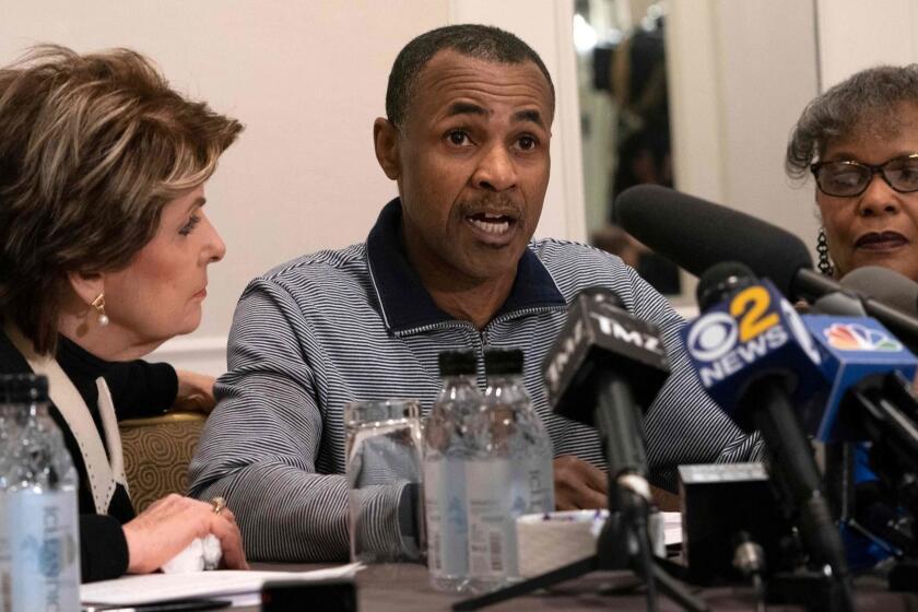 Gary Dennis speaks at a news conference along with attorney Gloria Allred (L) March 10, 2019 in New York. - Dennis says he found, and turned over to law enforcement, a vhs tape that appeared to show R. Kelly sexually abusing children. At right is Dennis' wife Sallie. (Photo by Don Emmert / AFP)DON EMMERT/AFP/Getty Images ** OUTS - ELSENT, FPG, CM - OUTS * NM, PH, VA if sourced by CT, LA or MoD **