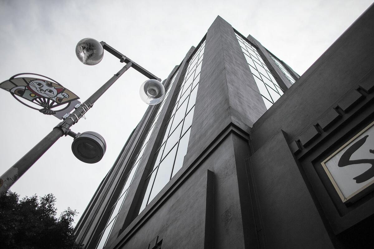 The building at 360-374 E. 2nd St. houses 110,000 square feet of office space atop 30,000 square feet of shops and restaurants. The building, bought by Atlanta developer Jamestown, is barely one-third occupied and in need of improvements.