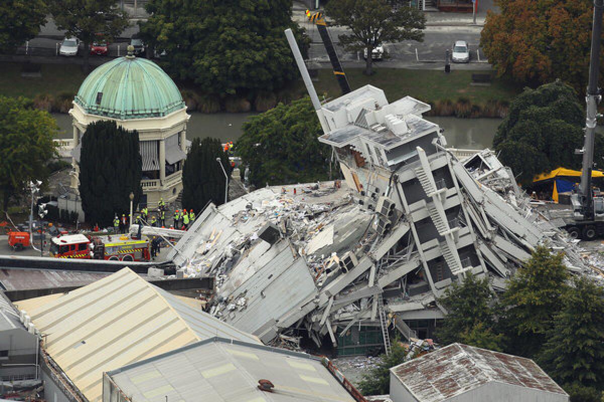 The Pyne Gould Corp. building collapsed when the magnitude 6.3 earthquake struck Christchurch, New Zealand, in 2011. It was built in the 1960s, before the adoption of modern seismic standards for concrete buildings. (Hannah Johnston / Getty Images)