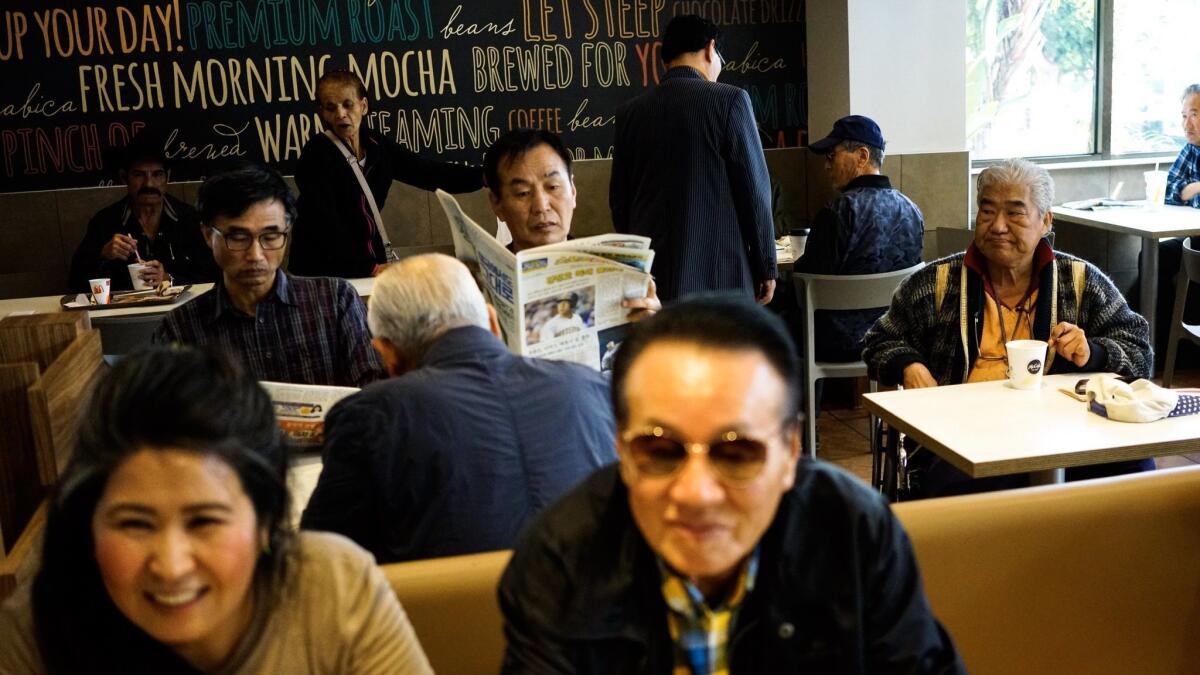 In L.A.'s Koreatown, residents had mixed reaction to the historic summit between South Korean President Moon Jae-in and North Korean leader Kim Jong Un.