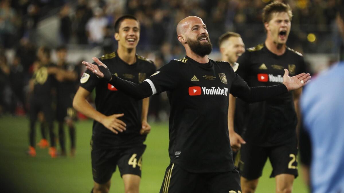 LAFC player Laurent Ciman acknowledges the cheers from the crowd after scoring the game-winning goal against the Seattle Sounders.