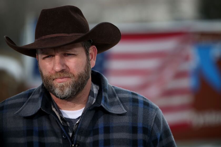 Ammon Bundy, the leader of an anti-government group, talks to reporters at the Malheur National Wildlife Refuge near Burns, Ore.