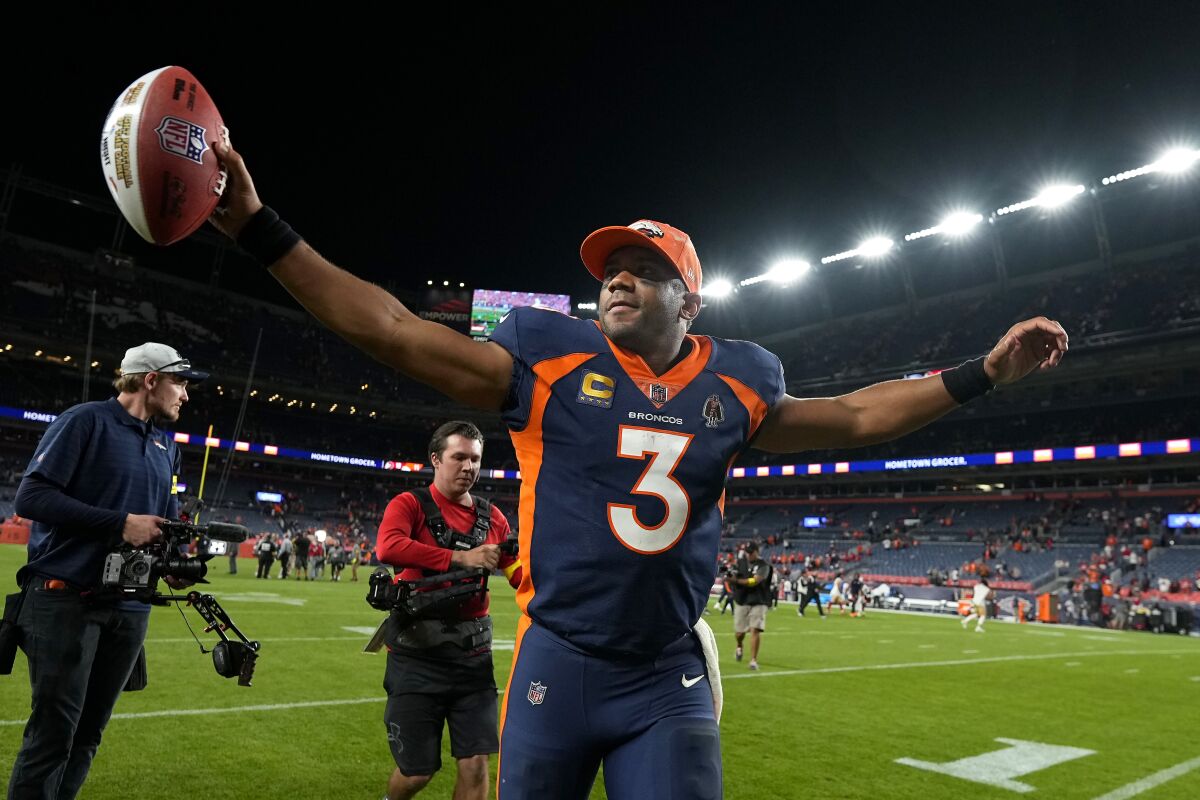 Denver Broncos quarterback Russell Wilson (3) celebrates after the Broncos defeated the San Francisco 49ers in an NFL football game in Denver, Sunday, Sept. 25, 2022. (AP Photo/Jack Dempsey)