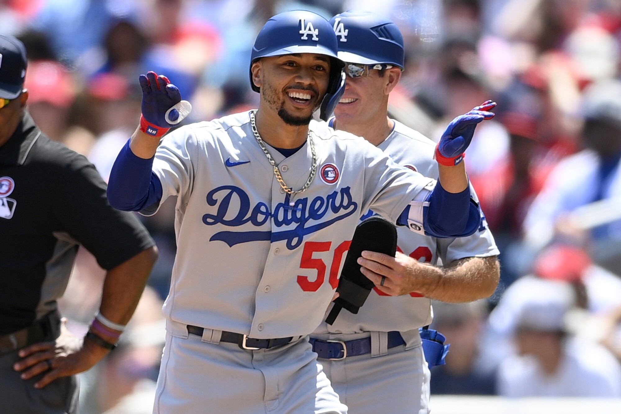 Mookie Betts reacts after he hitting a single during the Dodgers' win.