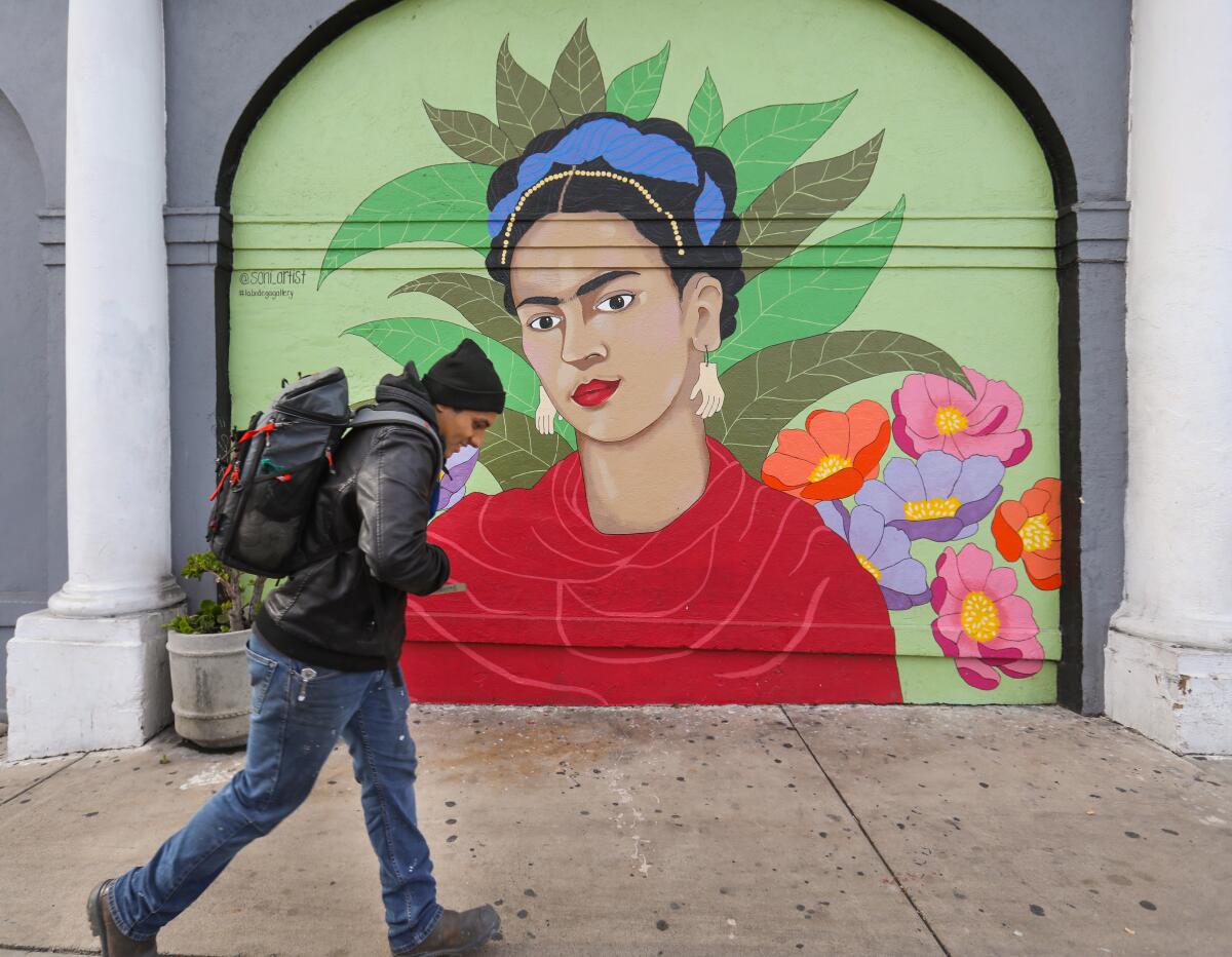 A pedestrian walked past La Bodega Gallery, which closed in 2019 .