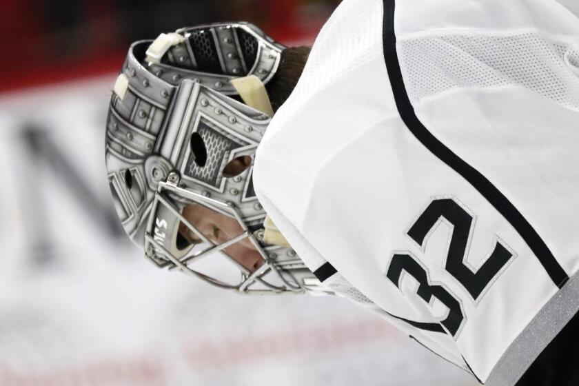 Los Angeles Kings' Jonathan Quick (32) hangs his head after giving up a goal to the Carolina Hurricanes during the second period of an NHL hockey game in Raleigh, N.C., Tuesday, Feb. 26, 2019. (AP Photo/Chris Seward)