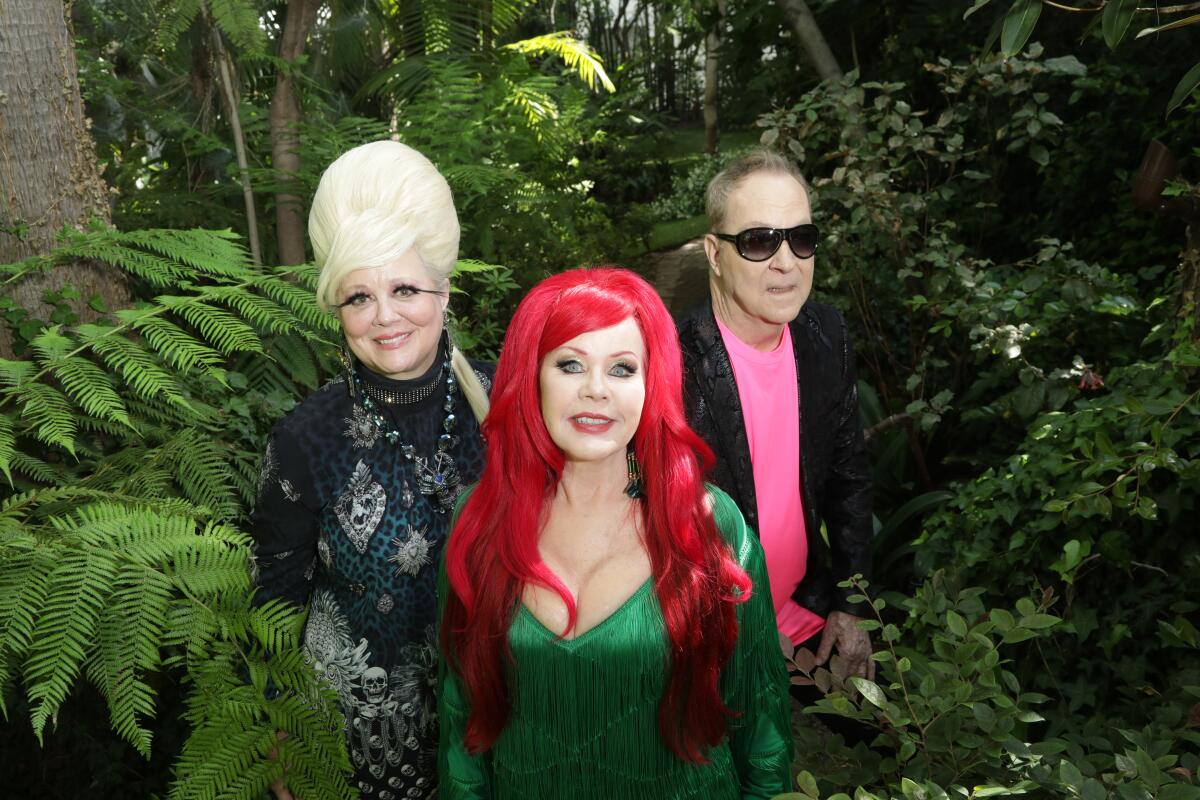 Cindy Wilson, left, Fred Schneider, right, and Kate Pierson, center, of "The B-52s". 