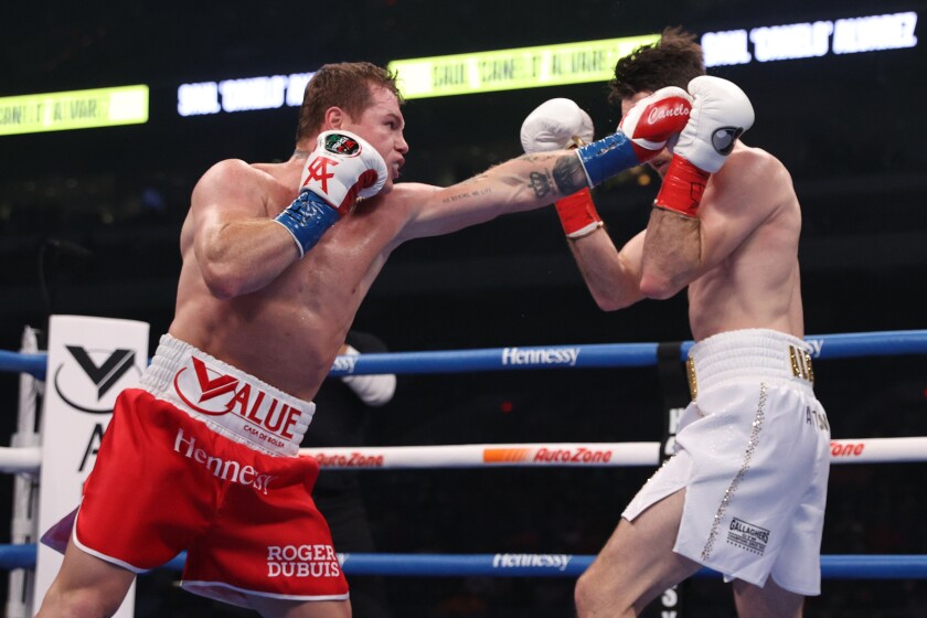Canelo Alvarez and Callum Smith fight at the Alamodome in San Antonio on Saturday.