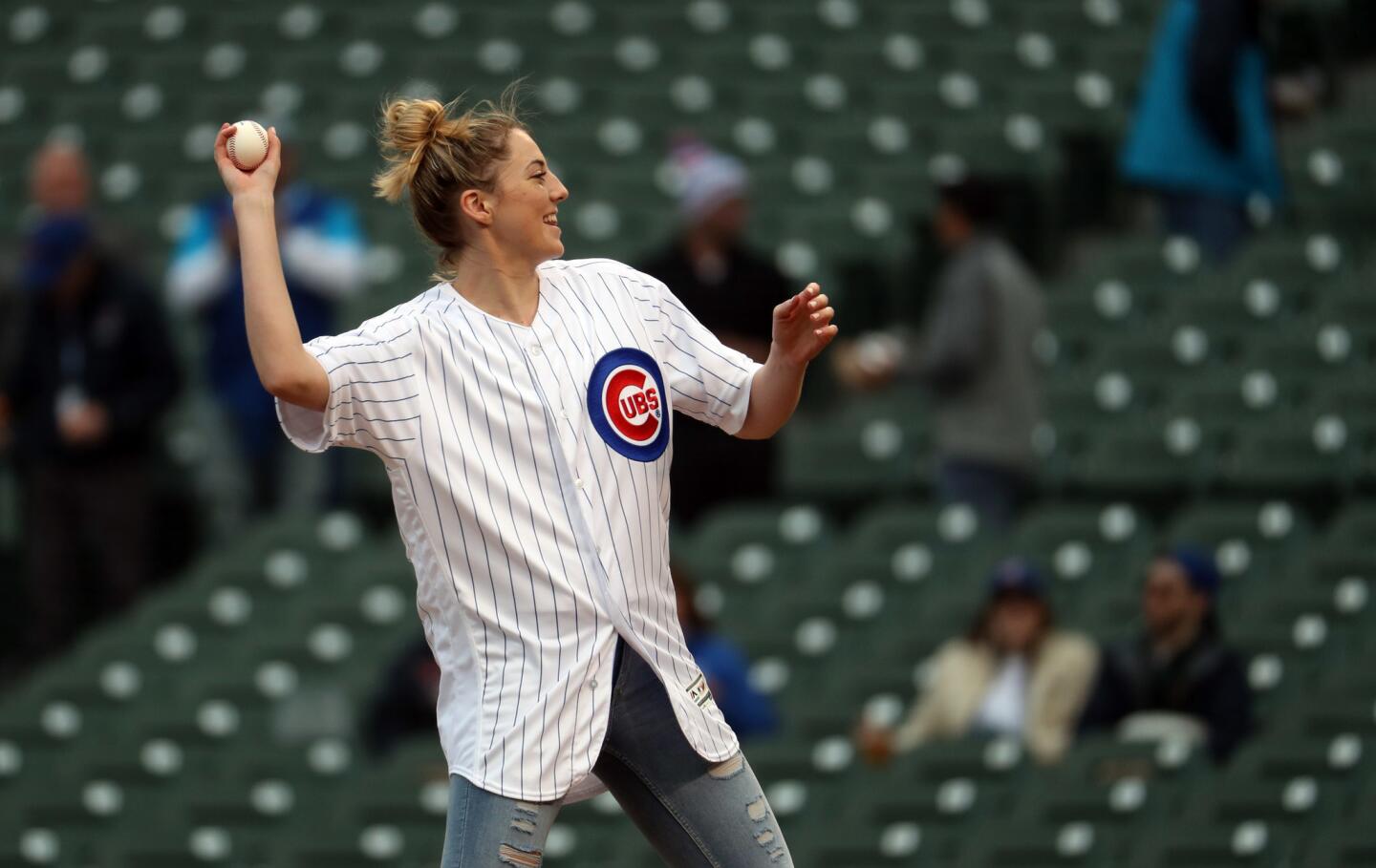 The Chicago Sky's Katie Lou Samuelson throws out a ceremonial first pitch before a Cubs-Marlins game at Wrigley Field on May 8, 2019.