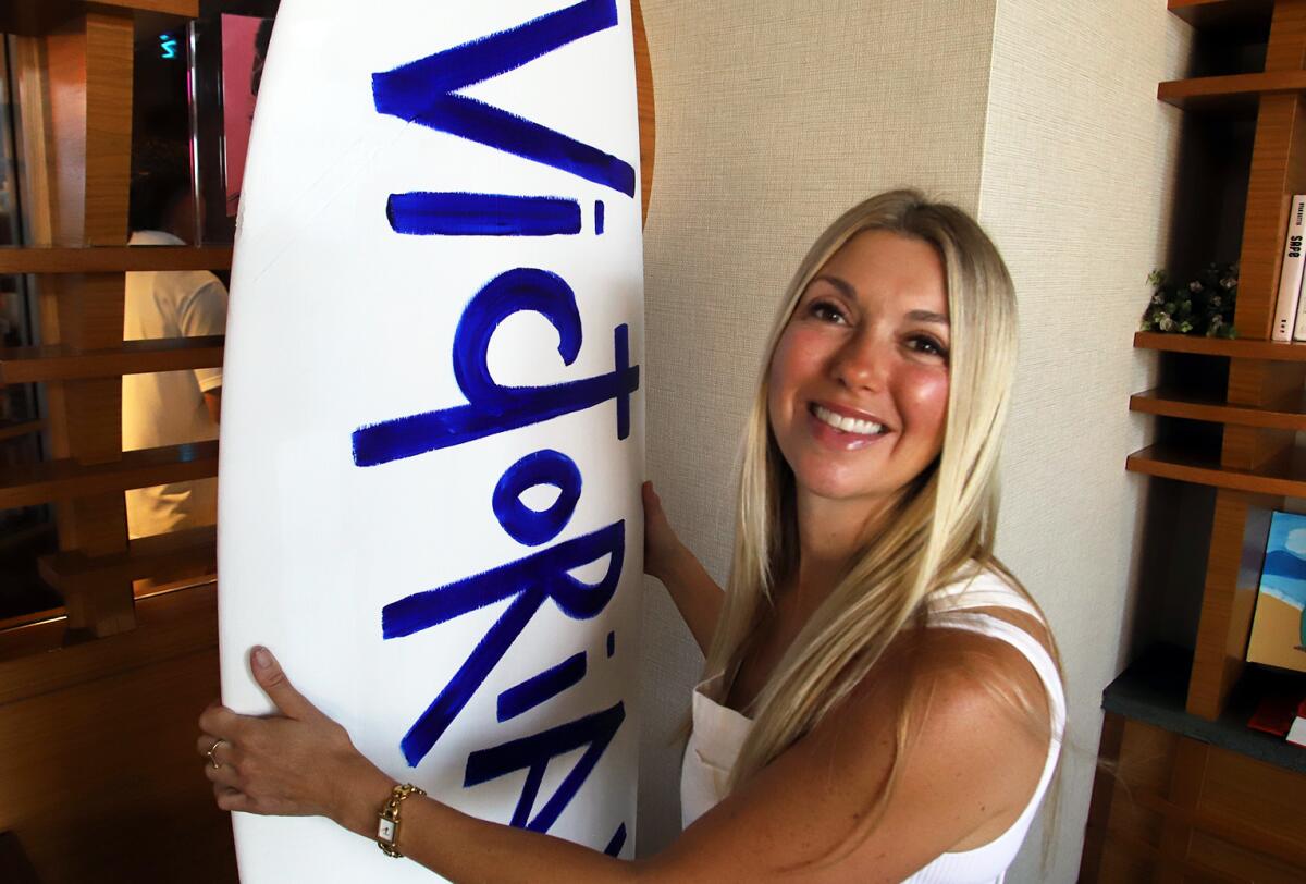 Victoria White, a Santa Monica-based artist, is a featured artist for this year's U.S. Open of Surfing.