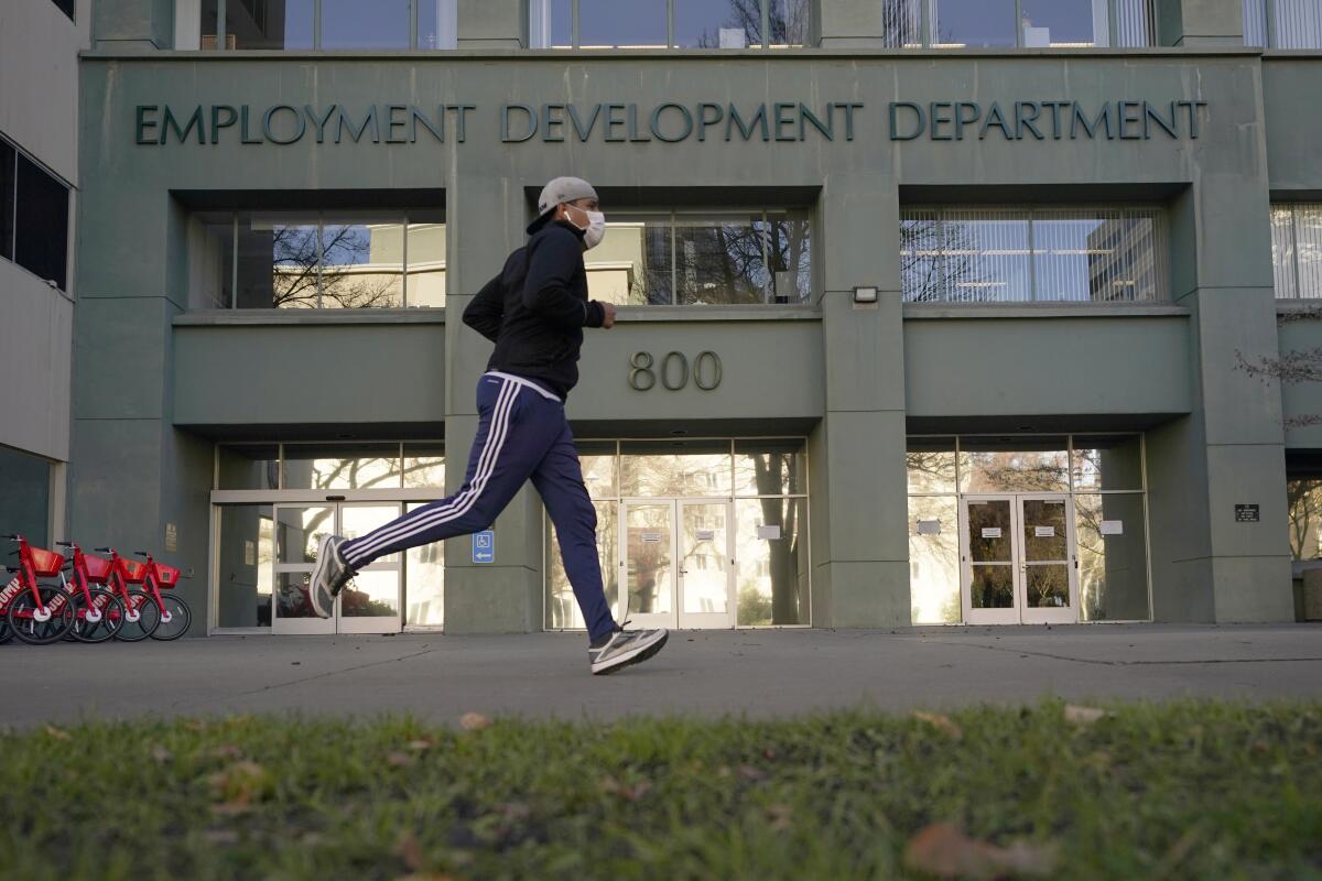 Jogger running past the California Employment Development Department