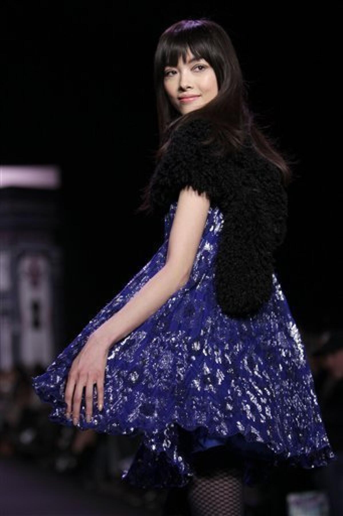 Fall 2011 fashion from Anna Sui is modeled during Fashion Week in New York, Wednesday, Feb. 16, 2011. (AP Photo/Seth Wenig)