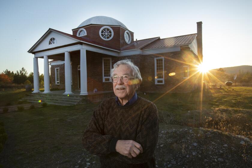 EASTERN WASHINGTON-OCTOBER 11, 2019: Dan Sisson, 82, stands in front of his home in Eastern Washington that is built to resemble Thomas Jefferson’s iconic home, Monticello. Sisson, 82, spent the last 3 decades hand building his home, digging the foundation with a shovel at age 61. (Mel Melcon/Los Angeles Times)