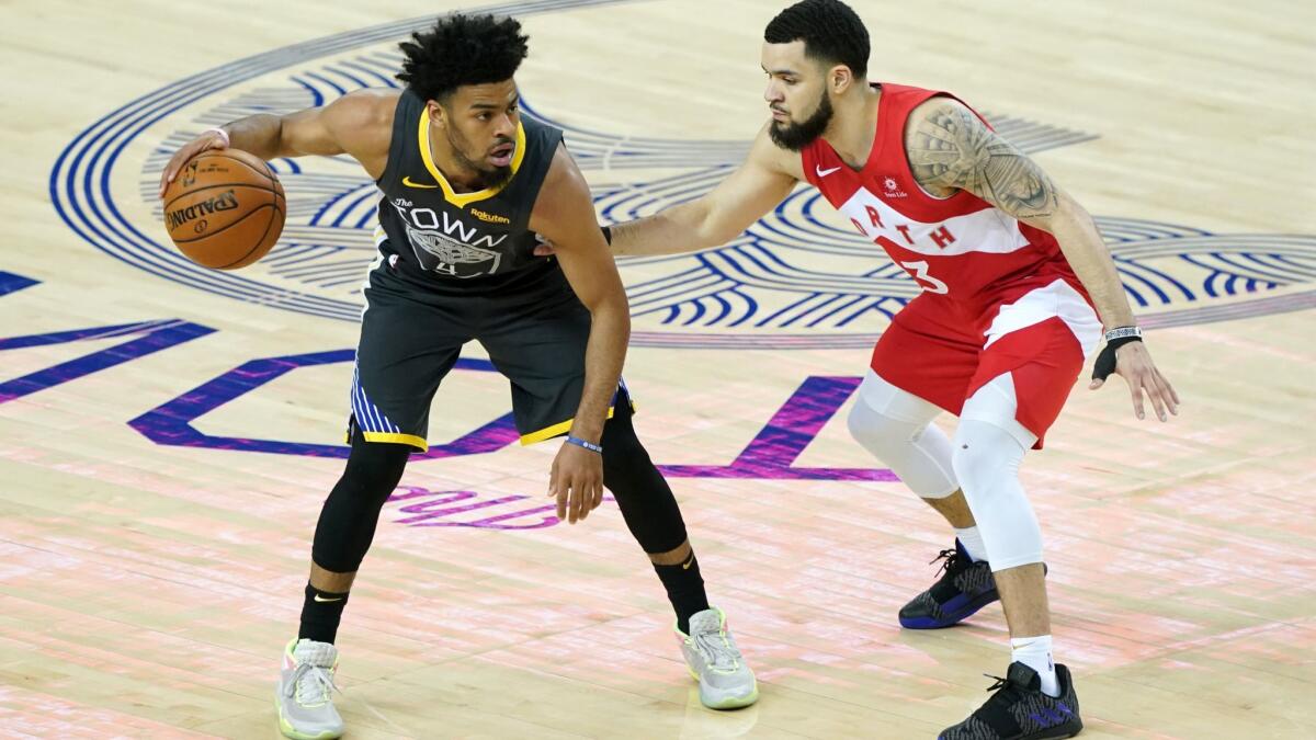 Quinn Cook, left, then of the Golden State Warriors, is defended by Fred VanVleet of the Toronto Raptors during Game 6 of the 2019 NBA Finals.