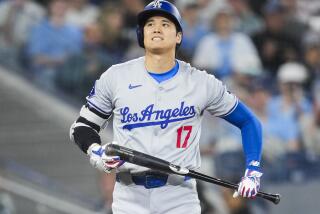 TORONTO, ON - APRIL 28: Shohei Ohtani #17 of the Los Angeles Dodgers reacts after a check swing against the Toronto Blue Jays during the first inning in their MLB game at the Rogers Centre on April 28, 2024 in Toronto, Ontario, Canada. (Photo by Mark Blinch/Getty Images)
