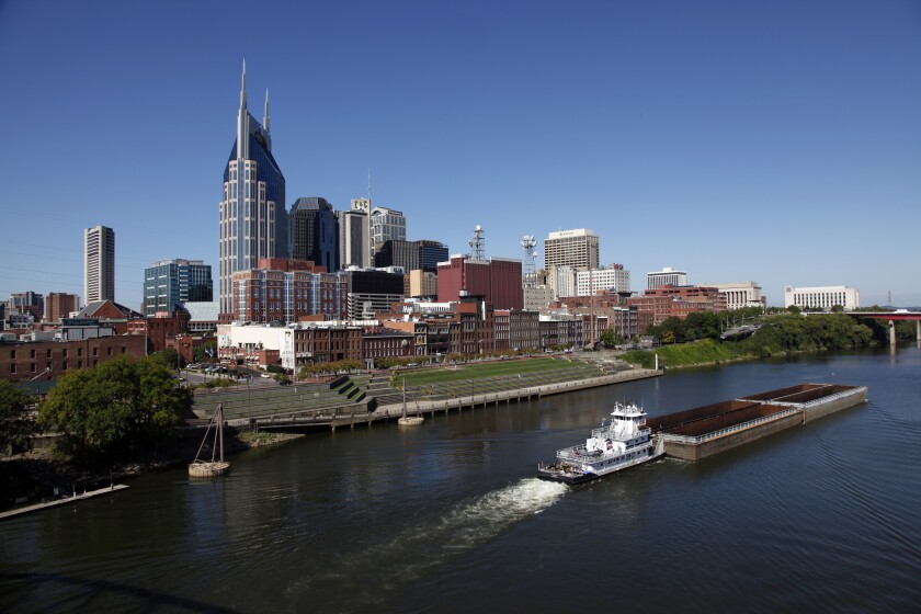 FILE - The Nashville, Tenn. downtown area and the Cumberland River are shown on Sept. 27, 2011. A bid to bring the 2024 Republican National Convention to Nashville has hit a roadblock in the Democratic-leaning city's metro council, where opposition has led proponents to withdraw a proposed agreement about how to host the event. (AP Photo/Mark Humphrey, File)