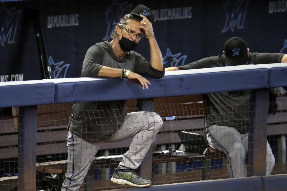 Miami manager Don Mattingly watches a scrimmage at Marlins Park on July 12