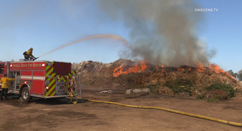 Firefighters battled a mulch fire at a nursery in Palm City on Sunday.