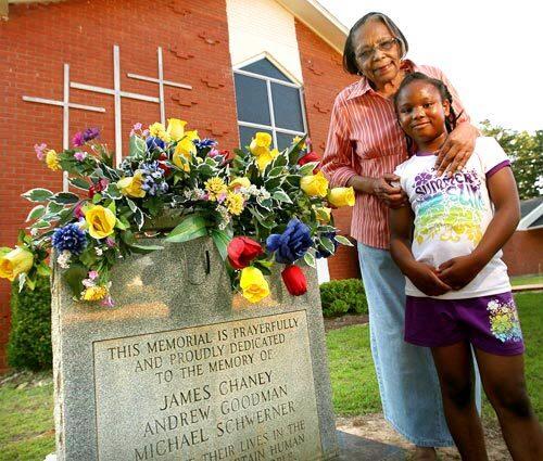 Sylvia Campbell, 74, and her great-granddaughter Haleigh Rolling, 6, stand in front of Mt. Zion United Methodist Church in Philadelphia, Miss. The predominantly black church was burned down in June 1964; three civil rights workers who came to investigate were murdered. Now, Philadelphia's county has cast the majority of its votes to make Barack Obama the nation's first black president.