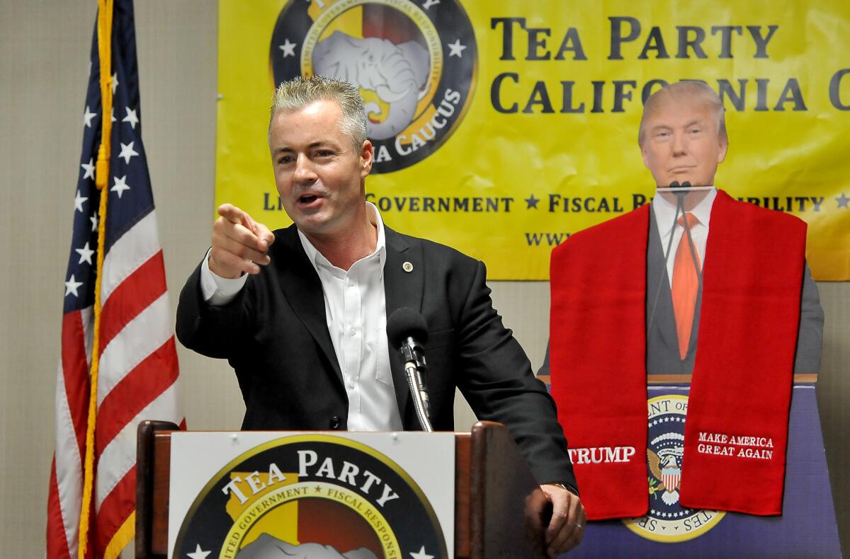 Republican gubernatorial candidate Travis Allen, an assemblyman from Huntington Beach, speaks to the Tea Party California Caucus conference in Fresno on Saturday.