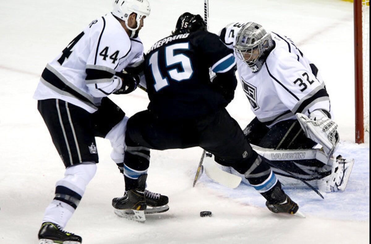 With Robyn Regehr (44) providing a hard-nosed veteran along the blue line, the Kings continued to improve this season as goaltender Jonathan Quick (32) recovered from off-season back surgery.